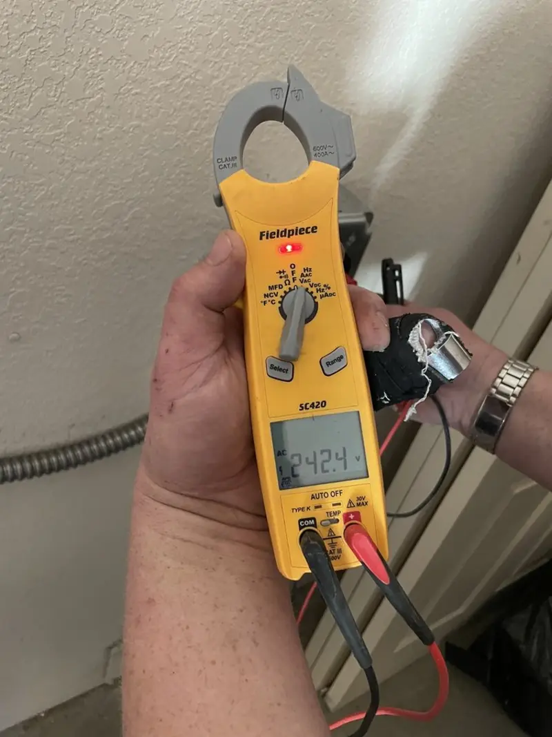 Voltage testing with clamp meter during Electrical Installation Services in Fort Myers Shores